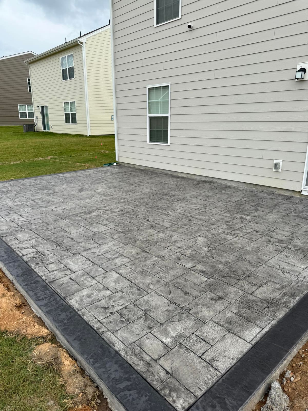 Professional Stamped Concrete installation in Charlotte, North Carolina by Local Concrete Charlotte — commercial-grade base prep, 6-inch compacted aggregate, expansion joints sawn within 12 hours.