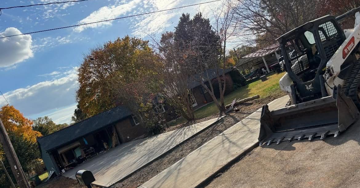 Completed Concrete Driveway Replacement installation in Pineville, NC by Local Concrete Charlotte — concrete contractor serving the Charlotte metro and Triangle since 2018, no deposit, no progress payments.