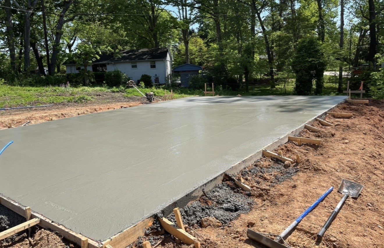 Step 11: Bull-Float to Close the Surface in Charlotte, NC concrete project by Local Concrete Charlotte